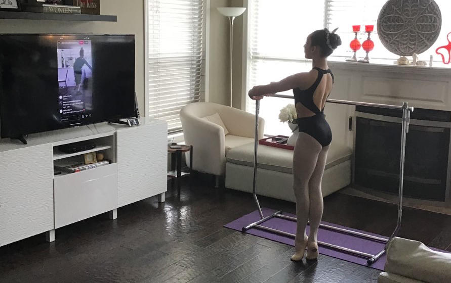 Child dances in living room 