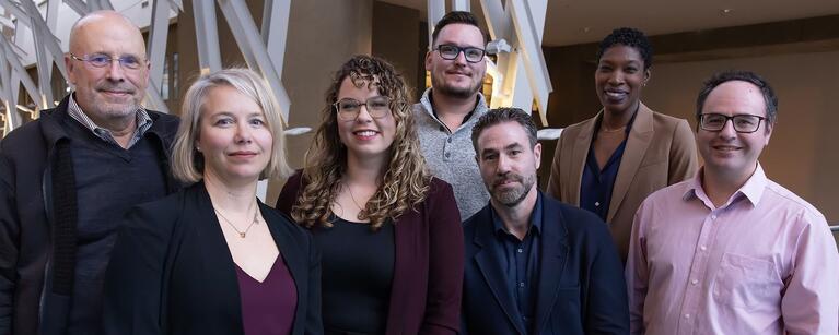 The MIST research team, including Dr. Keith Yeates, Dr. Chantel Debert, Dr. Leah Mayo, Dr. Alex Lohman, Dr. Matthew Hill, Dr. Araba Chintoh, and Dr. Alex McGirr pose for a group photo.