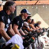 A group of people on spin bikes.