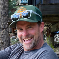 Close-up of Mike McClay, smiling and looking happy.