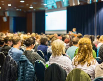 People in an auditorium